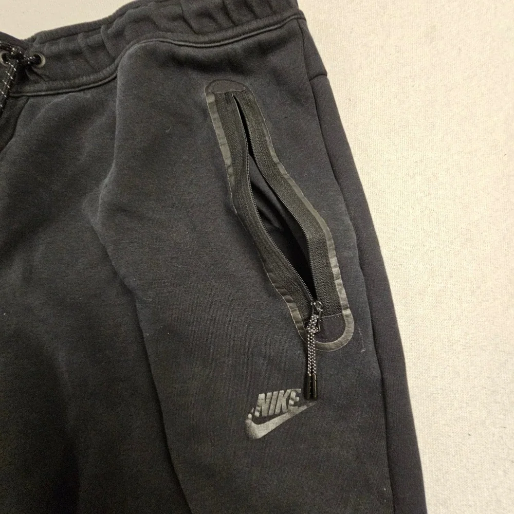 Nike Tech Fleece Joggers Mens Large Black Sweatpants Bungee Hem Zip Pocket